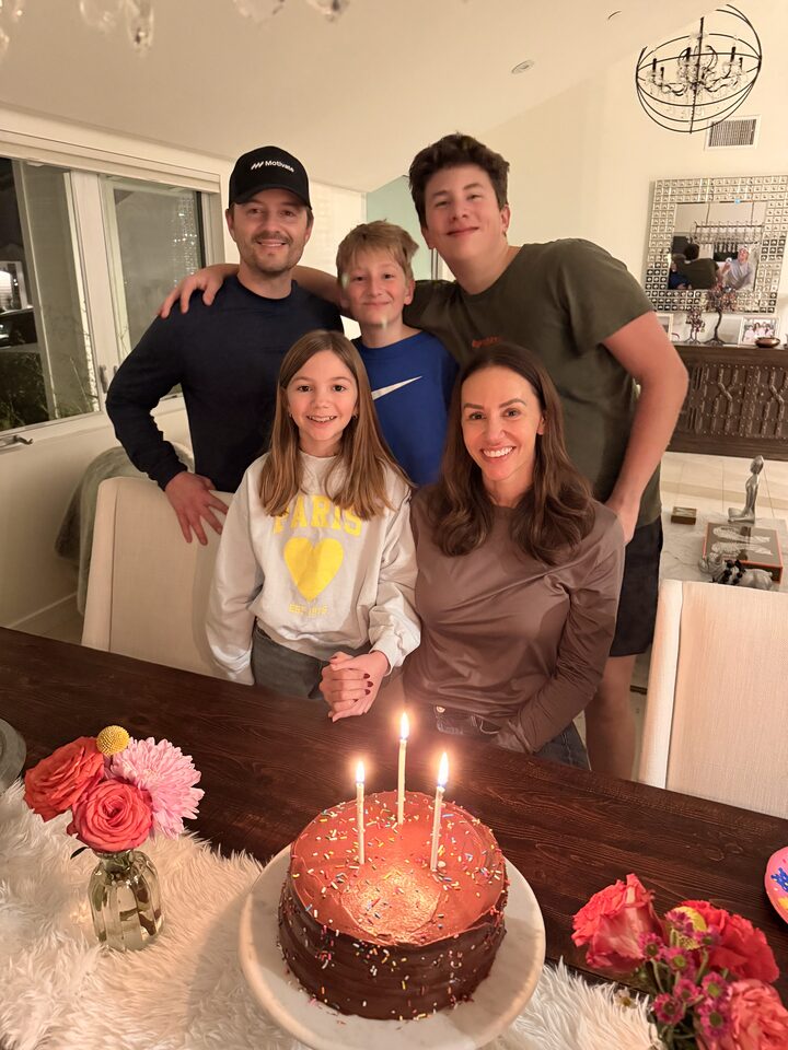 Client celebrating with family