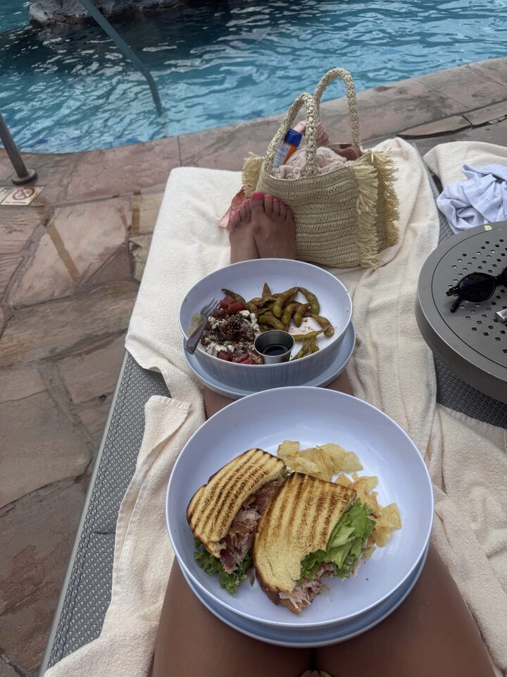 Client enjoying lunch poolside